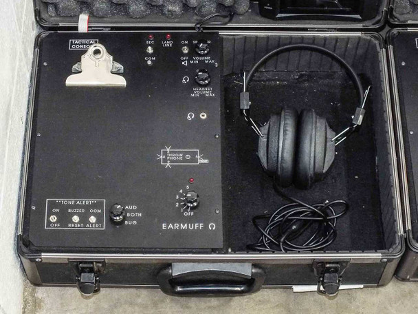 Tactical Console open case showing face plate labeled TACTICAL CONSOLE with THROW PHONE section, TONE ALERT controls, EARMUFF output, and over-ear headset