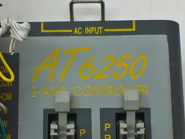 Parker Compumotor AT6250 label on side panel showing model name and '2-Axis Controller' designation with AC input terminals