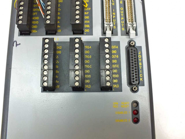 Parker Compumotor AT6250 panel detail showing trigger, output, and joystick terminal blocks with indicator LEDs