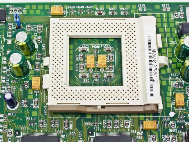 Close-up of CPU socket on PG4403-04 motherboard showing ZIF-style socket empty with barcode label M0302512