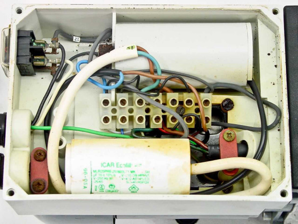 Leybold Trivac D1.6B junction box interior – showing ICAR run capacitor, terminal block with multi-colored wiring, and signs of corrosion on housing interior
