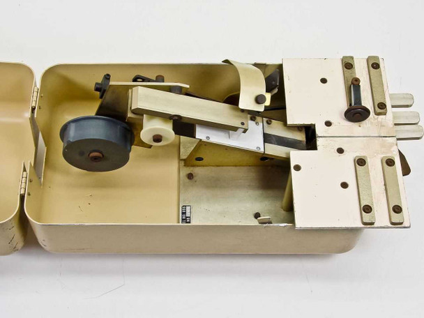 Gryphon 816 Film Splicer – top-down view with housing open showing internal film transport mechanism, roller, and splice bed