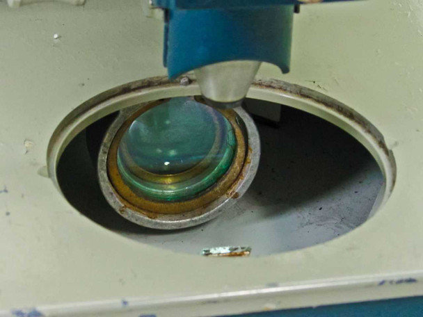 Macbeth TD-102 — close-up of transmission optics aperture and condenser lens assembly on sample stage base