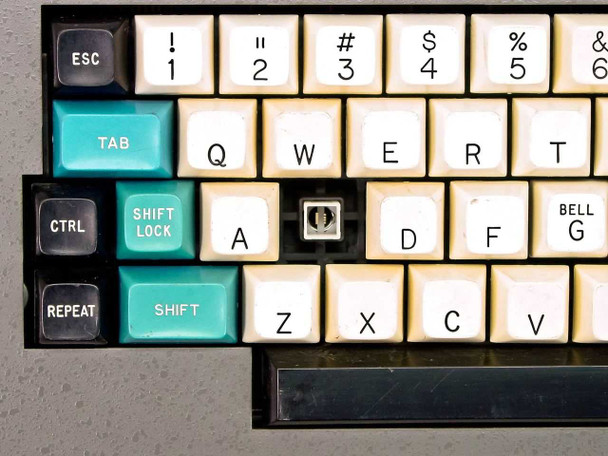 Close-up of left keyboard section showing missing 'S' key position between A and D rows, with QWERTY alpha keys visible