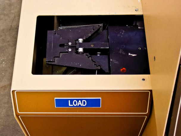 Tegal 701 load cassette station open top view showing wafer cassette arm and transport mechanism