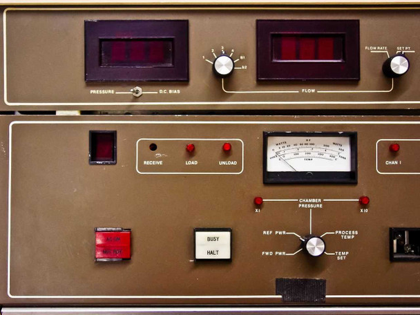 Tegal 701D front control panel close-up showing pressure and DC bias displays, flow display, chamber pressure analog meter, receive/load/unload indicators, Chan I, busy/halt button, REF PWR and FWD PWR knobs, and temp set controls