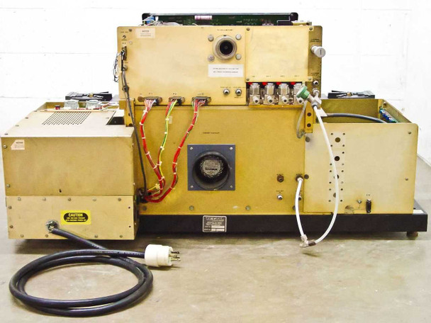 Tegal 803 rear view showing gold-anodized chassis, wiring harnesses, MFC gas plumbing, and heavy-duty power cord