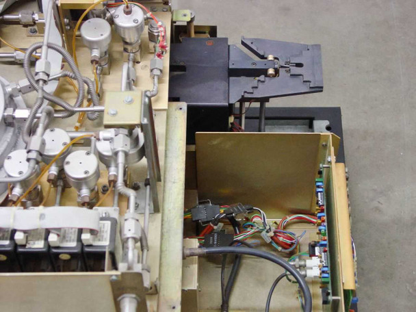 Tegal 803 interior overview from above showing gas delivery plumbing, process chamber area, wafer handler track, and secondary PCBs