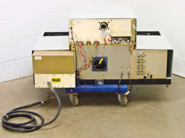 Tegal 803 Plasma Etcher – rear view showing wiring harnesses, large rotary disconnect switch, multiple gas/utility fittings, and power cable