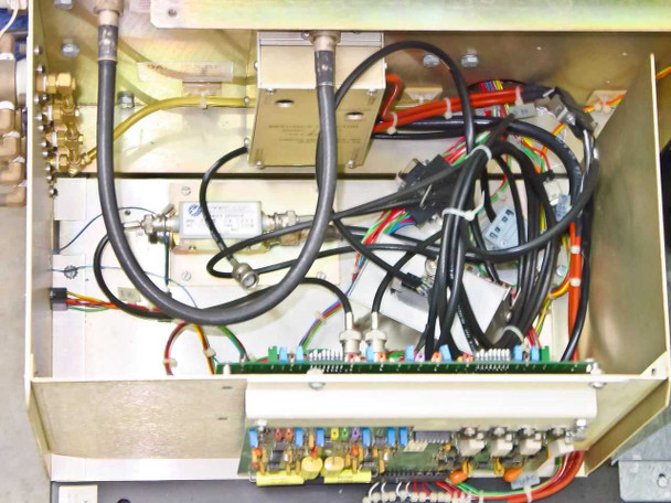 Tegal 803 interior – wiring bay showing control harnesses, gas line fittings, circuit boards including control PCB and fuse/relay board