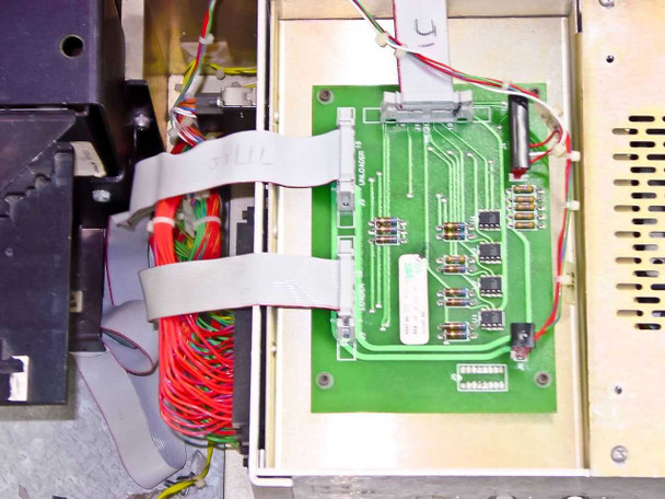 Tegal 803 – interior close-up of green control PCB with ribbon cable connections and wiring harness