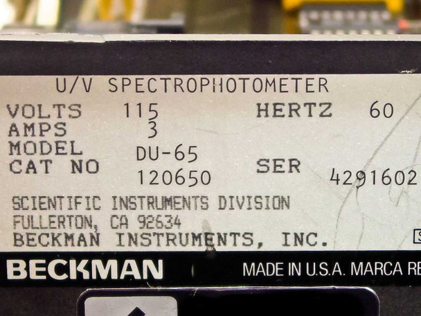 Beckman DU-65 rating plate showing Model DU-65, Cat No 120650, 115V 60Hz 3A, Serial 4291602, Beckman Instruments Inc. Scientific Instruments Division Fullerton CA