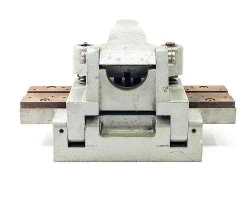 Hollywood Film Company PSC 16 – rear face view showing clamping block, spring assembly, and bronze-padded rail base