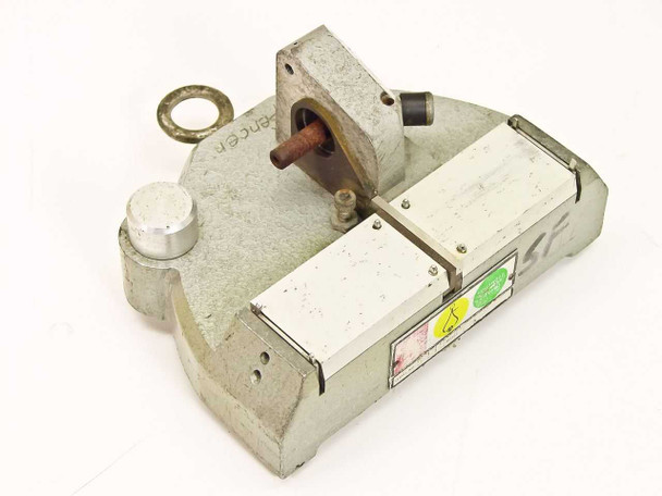 Hollywood Film Company TS-16 35mm tape film splicer — opposite top-front angle showing film guide rails, yellow and green Hollywood label stickers, and exposed center pivot post