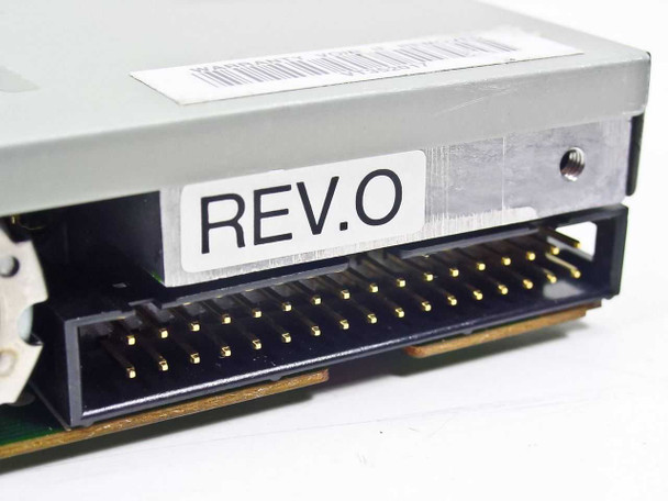 Sony MP-F17W-FP floppy drive — rear closeup of 34-pin data connector and REV.O label