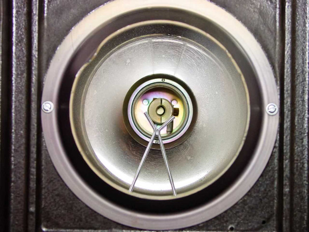 LP Associates 8510 Xelamp — close-up of front output aperture showing empty lamp socket with spring retainer clips and no bulb installed