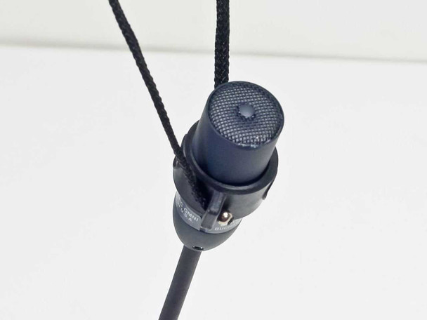University Sound US649B lavalier microphone – top-down view of capsule grille with lanyard cord attached