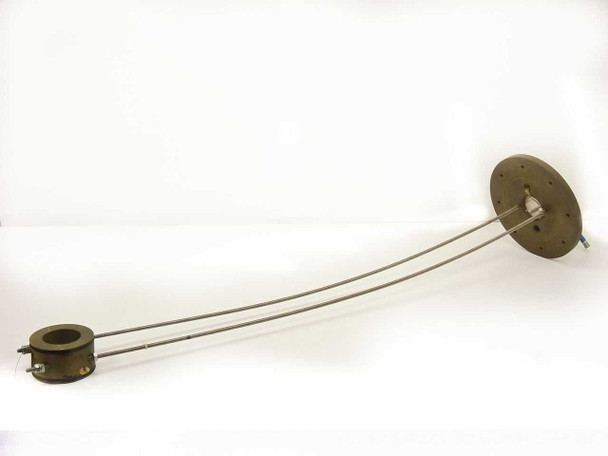 Vacuum solenoid coil assembly full length view showing brass toroidal coil housing at left, stainless steel support rods, and circular flanged end plate at right — 38 inches overall length