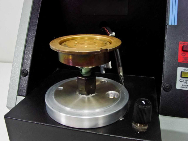 Anatech Hummer VII sputtering chamber close-up showing gold target dish, support pedestal, and adjustment knob