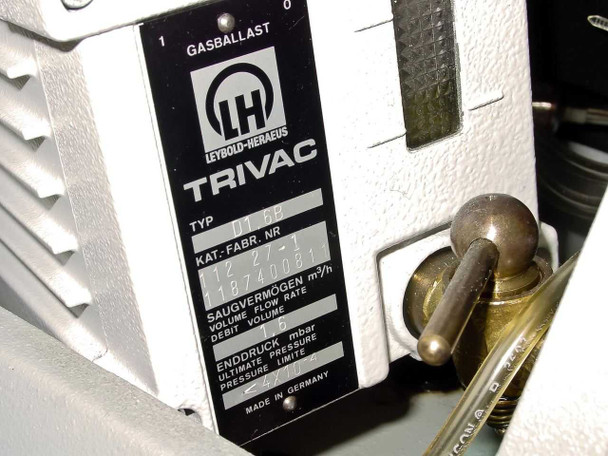Leybold-Heraeus Trivac D1.6B vacuum pump label showing type, catalog/fabrication number, volume flow rate, and ultimate pressure — Made in Germany