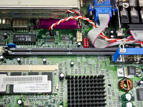 Neoware EON internal PCB close-up showing SO-DIMM memory module, HN1681SS chip, main processor heatsink area, and ribbon cable connectors