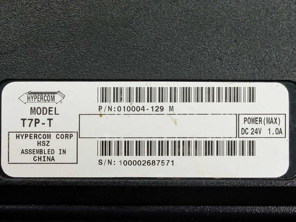 Hypercom T7P-T bottom label showing Model T7P-T, P/N 010004-129M, DC 24V 1.0A power rating, assembled in China, serial number