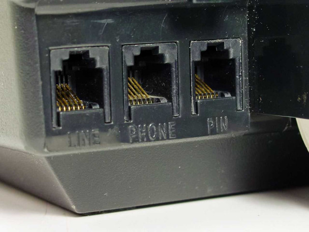 Hypercom T7P-T rear port panel showing LINE, PHONE, and PIN RJ-style communication ports