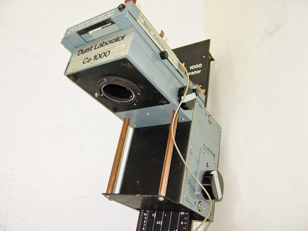 Durst Laborator Ce 1000 low-angle view showing enlarger head lens port opening and Camcopy attachment from below