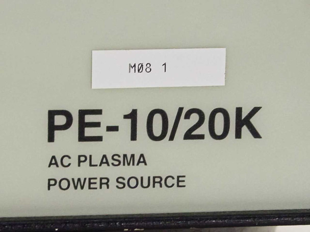 Advanced Energy PE-10/20K front panel label closeup showing model designation PE-10/20K and AC PLASMA POWER SOURCE text with internal inventory tag M08 1