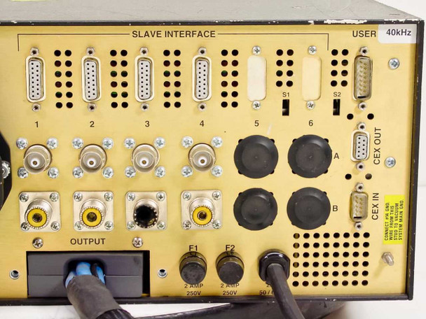 Advanced Energy PE-10/20K rear panel closeup showing six Slave Interface DB connectors, USER port, 40kHz label, BNC connectors, CEX OUT ports A and B, OUTPUT connector, and F1/F2 fuse holders
