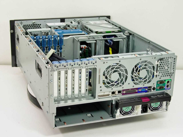 HP ProLiant ML370 tower server – angled rear-left view showing motherboard, PCI expansion slots, redundant power supply, and rear fan housings