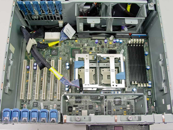 HP ProLiant ML370 motherboard top-down view showing dual CPU sockets, DIMM memory slots, and PCI-X expansion slots