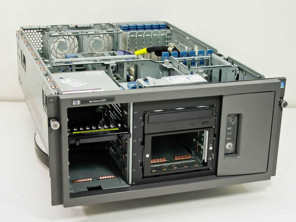 HP ProLiant ML370 tower server – angled front-left view with side panel removed showing empty drive bays and CD-R drive