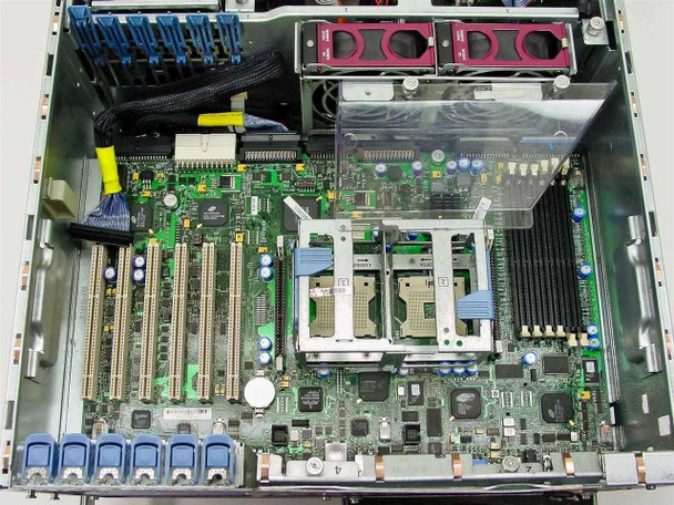 HP ProLiant ML370 motherboard close-up showing dual CPU sockets empty, memory slots empty, and PCI expansion slots