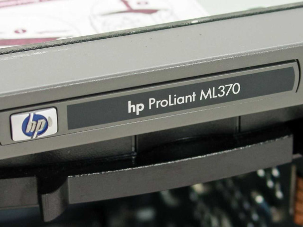 HP ProLiant ML370 front panel badge close-up showing HP logo and ProLiant ML370 model nameplate