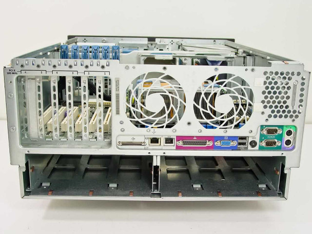 HP ProLiant ML370 rear interior view showing dual large cooling fans, expansion slots with cards installed, and rear I/O port cluster