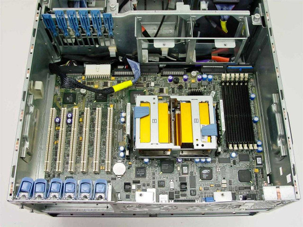 HP ProLiant ML370 motherboard top-down view showing CPU sockets, empty DIMM memory slots, PCI expansion slots, and onboard components