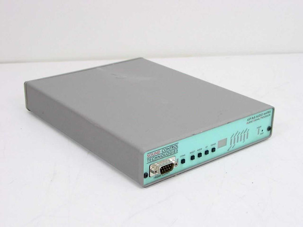 Sound Control Technologies ASP-8x8 Audio Matrix DSP Signal Processor – left-side three-quarter view showing teal front panel and DB9 front comm port
