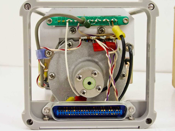 HP 5253B Frequency Converter rear interior close-up showing motor/drive mechanism, green PCB strip, wiring harness, and blue 50-pin multi-pin connector