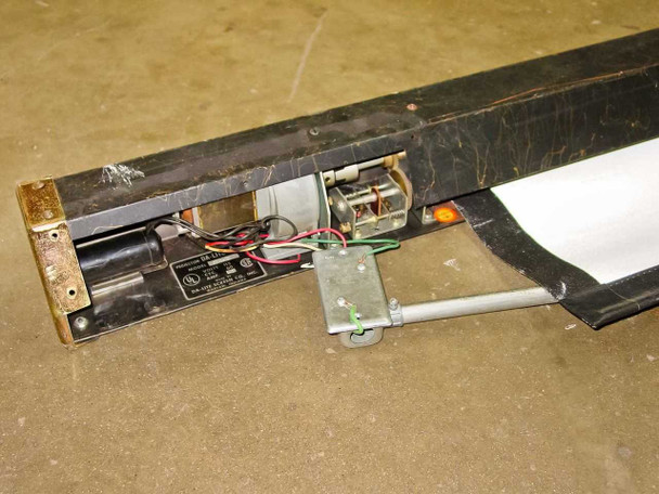 Da-Lite Junior Electrol end cap removed showing internal motor, wiring, and drive mechanism components
