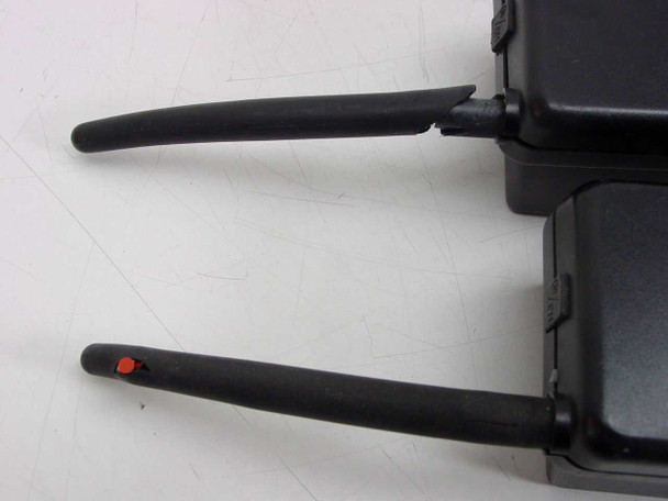 Close-up of two AT&T MDW 9000 handset antennas showing torn and cracked rubber covers
