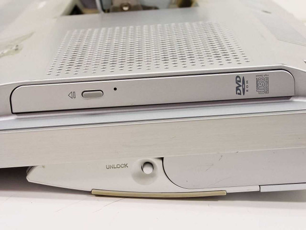 Sony Vaio PCV-W510G opposite side edge showing DVD drive slot and UNLOCK latch mechanism