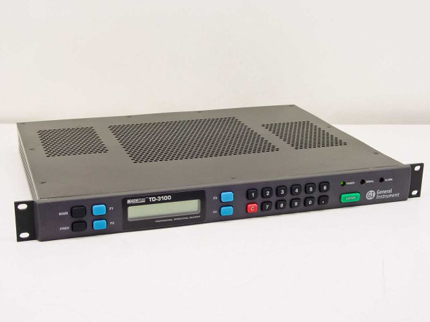General Instrument TD-3100 Magnitude Professional Terrestrial Decoder — front panel full view showing LCD display, keypad, and GI logo, 1U rackmount chassis