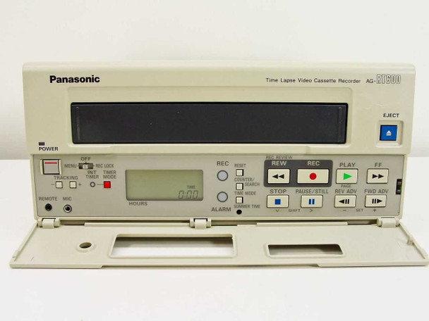 Panasonic AG-RT600P Time Lapse VCR — front panel with cassette door open revealing full transport controls including REW, PLAY, FF, STOP, PAUSE/STILL, REC, RESET, and mode switches