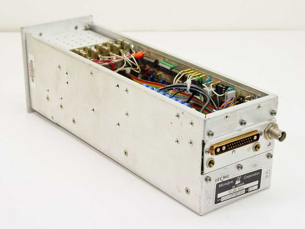 Microdyne 1111-VT RF Tuner – rear three-quarter view showing D-sub P1 connector, BNC J1 connector, and internal wiring with REV M62 label