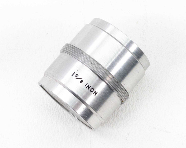 Separate 1-5/8 inch optical adapter component — silver machined aluminum cylindrical barrel with engraved 1-5/8 INCH size label