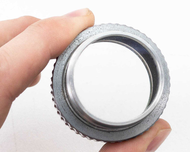 Simpson Optical Perceptordaptor 137-0001 — front aperture view showing clear optical glass element and aluminum inner barrel