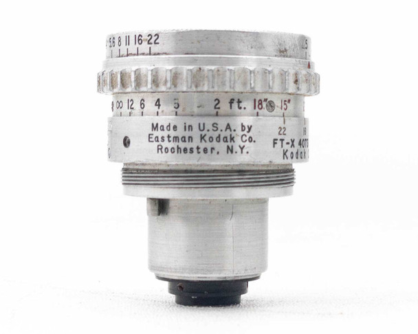 Kodak Cine Ektar 15mm f/2.5 FT-X 4073 – front face showing 'Made in U.S.A. by Eastman Kodak Co. Rochester, N.Y.' label and focus/aperture scales; wear and patina on chrome visible