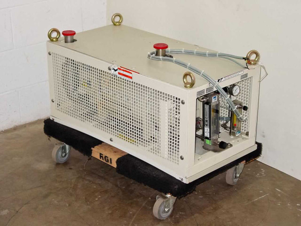Ebara 40X20 dry vacuum pump front-left view on wheeled transport dolly with red emergency stop buttons and lifting eyes visible on top