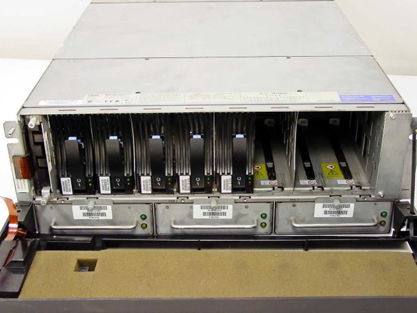 IBM 7133-D40 front drive bay view showing upper SSA drive modules and lower power supply bays with green LEDs